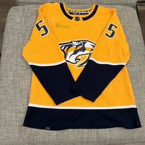 NWT Authentic Nashville Predator Jersey.